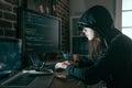 Professional female hacker using keyboard typing Royalty Free Stock Photo