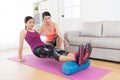 Professional female individual home fitness tutor Royalty Free Stock Photo