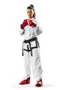 Professional female karate fighter isolated on the white background Royalty Free Stock Photo