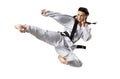 Professional female karate fighter isolated on Royalty Free Stock Photo