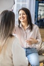 Professional female makeup artist applying cosmetics on model face use brush working at beauty salon Royalty Free Stock Photo