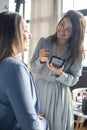 Professional female makeup artist applying cosmetics on model face use brush working at beauty salon Royalty Free Stock Photo