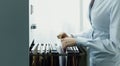 Office clerk searching files in the filing cabinet