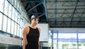 Female swimmer preparing and jumping off the starting block Royalty Free Stock Photo