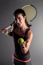 Professional female tennis player. Girl with racket and ball Royalty Free Stock Photo