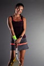 Professional female tennis player. Girl with racket and ball Royalty Free Stock Photo