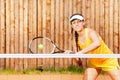 Professional female tennis player waiting for ball Royalty Free Stock Photo