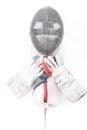 Professional fencing equipment, mask, gloves and rapier isolated