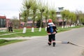 Professional firefighters, rescuers in protective fireproof suits, helmets and gas masks with oxygen bottles are prepared to rescu