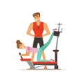 Professional fitness coach and woman exercising on trainer gym machine, people exercising under control of personal