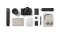 Flat lay arrangement of camera accessories and tech gear on clean white minimalist background Royalty Free Stock Photo