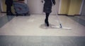 Professional floor washes at work