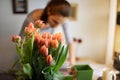 Professional florist girl collecting flowers Royalty Free Stock Photo