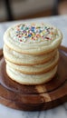 Professional food photography of frosted sugar cookies with colorful sprinkles for enticing visuals