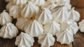 Professional food photography of meringue cookies elegantly presented on a stylish kitchen table