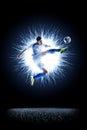 Professional football soccer player in action on black Royalty Free Stock Photo