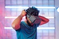 Professional gamer wearing VR by with mobile inside the headset before playing - concept of modern gaming technology Royalty Free Stock Photo