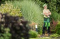 Professional Garden Worker with Pro Scissors in His Hands Royalty Free Stock Photo