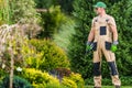 Professional Gardener Proudly Standing in His Garden