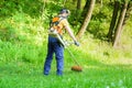 Professional gardener using an hedge clippers in home garden Royalty Free Stock Photo