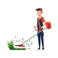 Professional gardener working on backyard and mowing lawn with electric mower. Male handyman cutting grass in garden Royalty Free Stock Photo