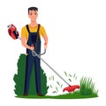 Professional gardener working on backyard and mowing lawn with electric mower. Male handyman cutting grass in garden