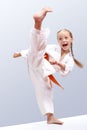 Professional girl does karate kick Royalty Free Stock Photo