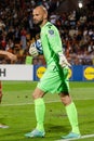 Professional goalkeeper Ognjen Cancarevic in mid-action during a soccer match in Armenia