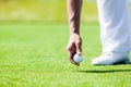 Hand of Professional Golf Player teach how to Teed Up Golf Ball Royalty Free Stock Photo