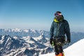 Professional guide - climber on the snow-covered summit of Elbrus sleeping volcano Royalty Free Stock Photo
