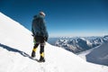 Professional guide - climber on the snow-covered summit of Elbrus sleeping volcano Royalty Free Stock Photo