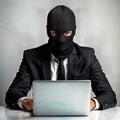 Professional Hacker in Dark Suit Using Laptop