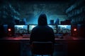 A professional hacker, hooded and enigmatic, seated in front of a bank of multiple computer screens
