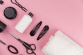 Professional hair dresser tools with copy space. Hair stylist equipment set on pink background. Royalty Free Stock Photo