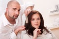 Professional hairdresser choose hair dye color Royalty Free Stock Photo