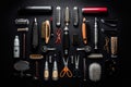 Professional hairdresser tools on black background. Top view, Full frame of professional hairdresser tools against a black Royalty Free Stock Photo