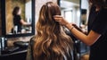 a professional hairstylist cutting and styling a clients hair