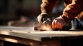 Professional handyman using power drill for wood drilling during home improvement project Royalty Free Stock Photo