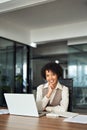 Professional happy African American business woman in office, vertical portrait. Royalty Free Stock Photo