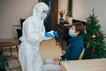 Health professional and a senior woman during home visit during Covid-19 Pandemic Royalty Free Stock Photo