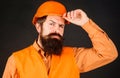 Professional Heavy Industry Engineer. Construction worker in hard hat. Bearded man in Safety Uniform and helmet. Male builder. Royalty Free Stock Photo