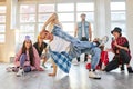 professional hip hop dancer in motion, showing movements for people surrounding dancer Royalty Free Stock Photo