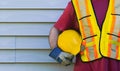 Professional Holding Hard Hat