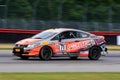 Professional Honda Civic Si race car on the course Royalty Free Stock Photo