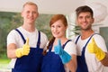 Professional house cleaners smiling