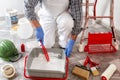 Professional house painter at work prepares the wall paint Royalty Free Stock Photo