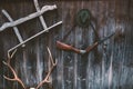 Professional hunters equipment for hunting. Rifle, Deer, Roe deer trophy sculs and others on a wooden black background. Trophy scu Royalty Free Stock Photo