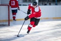 Professional ice hockey player in attack on the rink Royalty Free Stock Photo