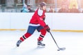 Professional ice hockey player in attack on the rink Royalty Free Stock Photo