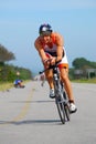 Professional Ironman triathlete cycling Royalty Free Stock Photo